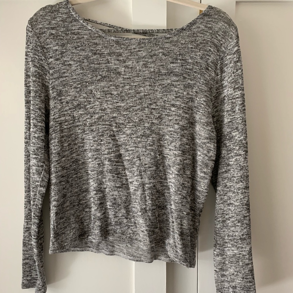 Sweater with detailed backing